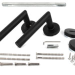 Angular door handle with rosette for interior doors |Powerful retaining spring, support cams |Black