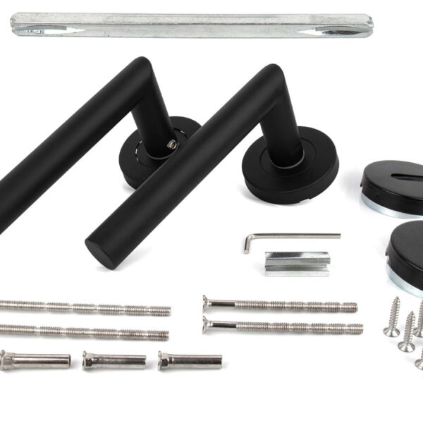 Angular door handle with rosette for interior doors |Powerful retaining spring, support cams |Black